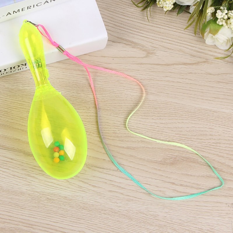 светящаяся_погремушка_на_шнурке_маракас_цвет_желтый